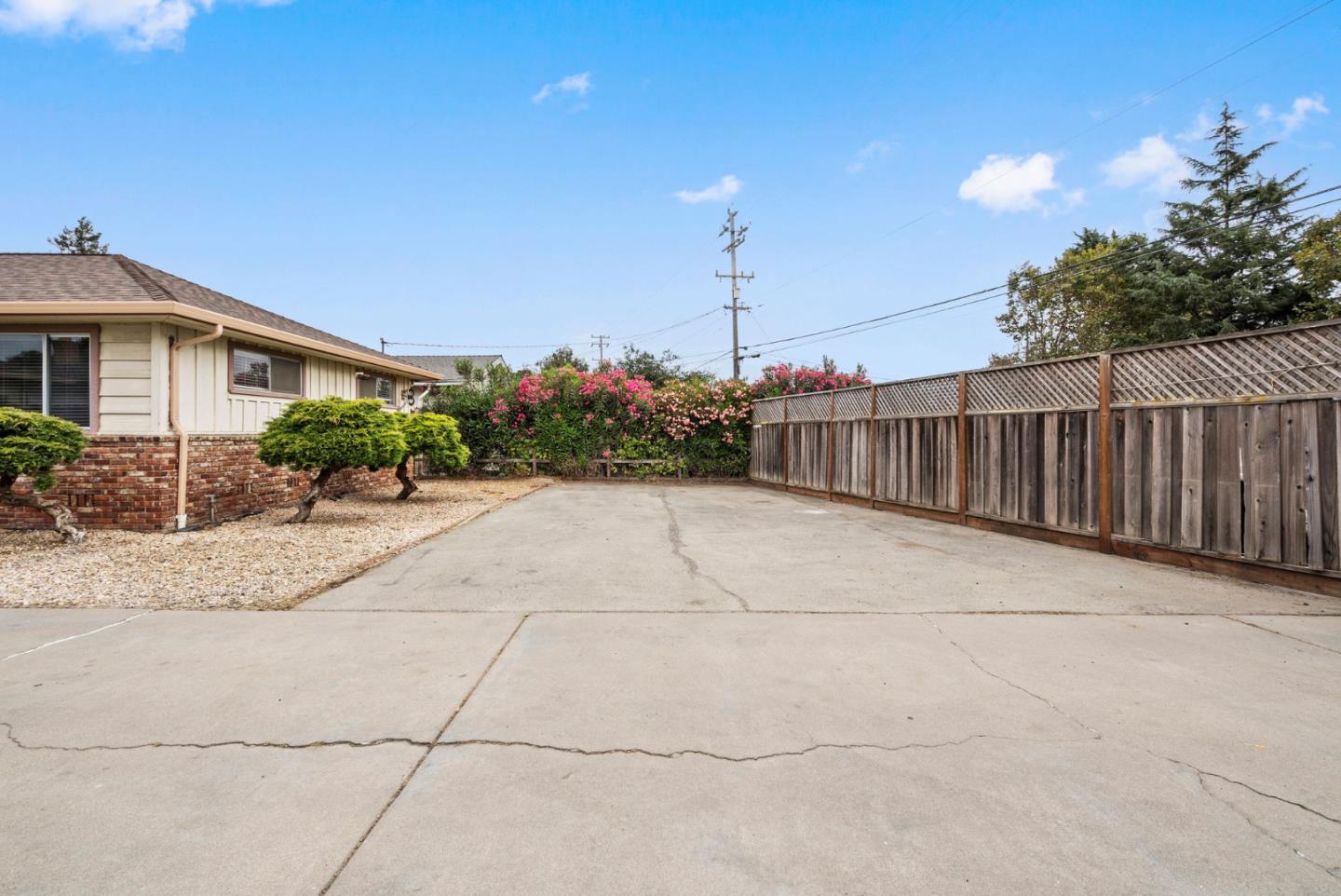 345 Green Valley Road Watsonville, CA 95076 - Photo 7 of 44 a view of a house with a street