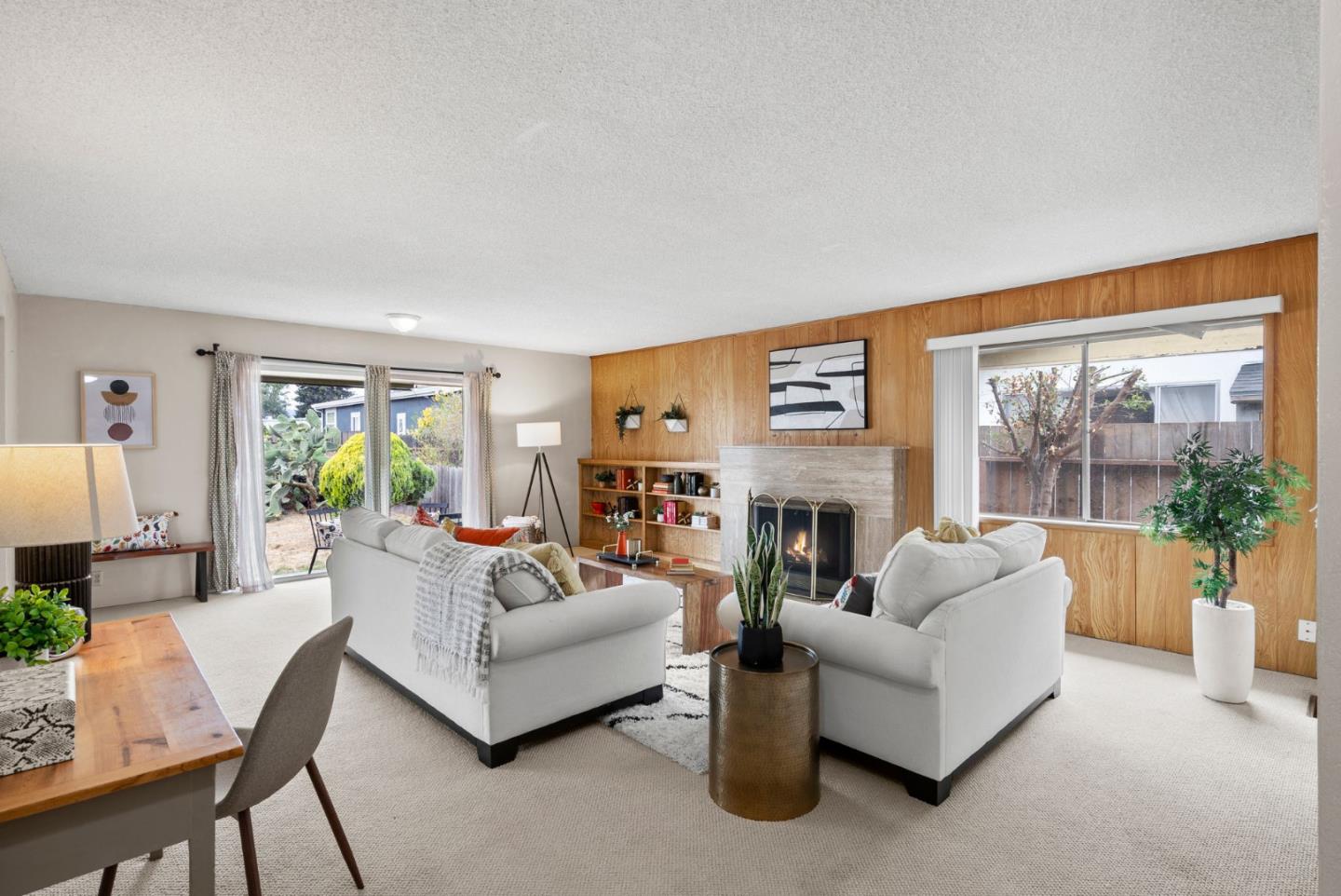 345 Green Valley Road Watsonville, CA 95076 - Photo 8 of 44 a living room with fireplace furniture and a large window