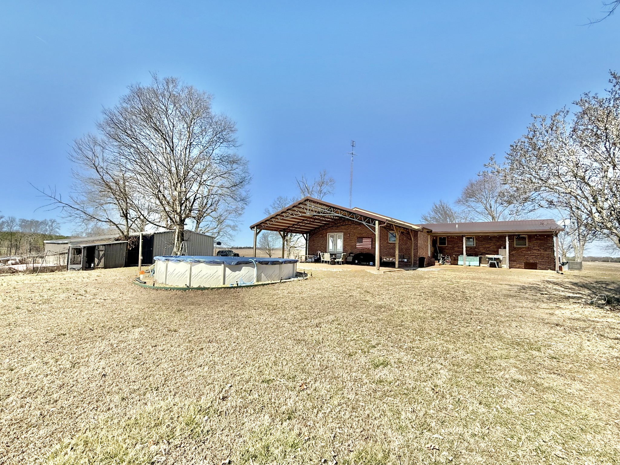 122 McIntyre Road Iron City, TN 38463 - Photo 2 of 15 a big room with yard and a large tree