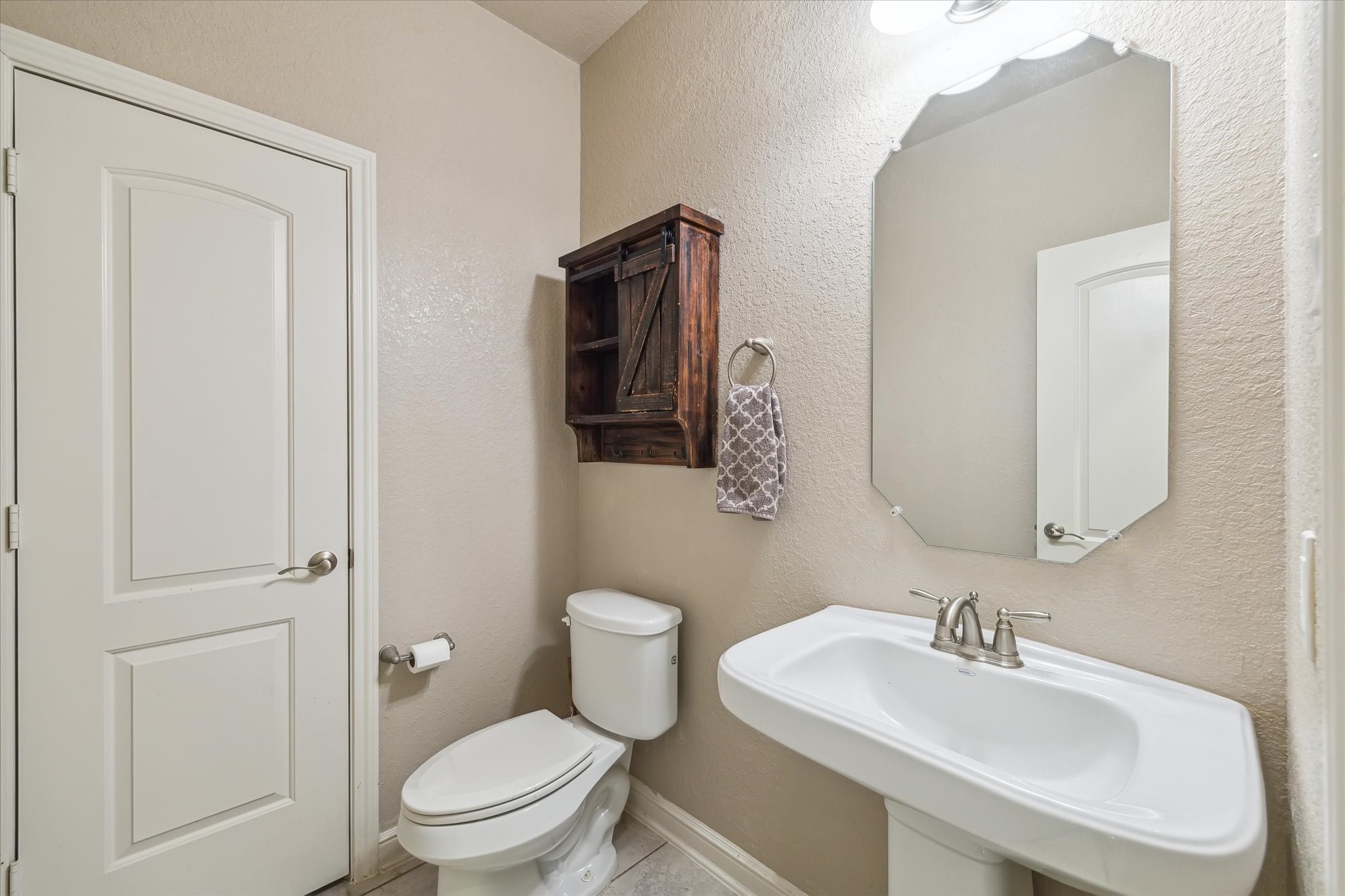 4914 Mountain Maple Trail Rosenberg, TX 77471 - Photo 21 of 23 Half bathroom with fantastic storage closet.