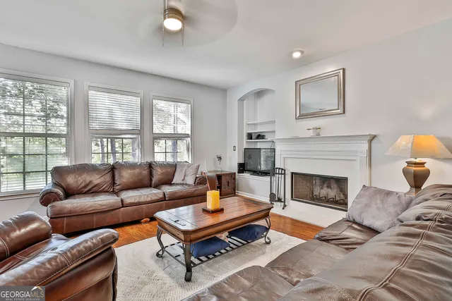 a kitchen with stainless steel appliances a refrigerator sink and cabinets