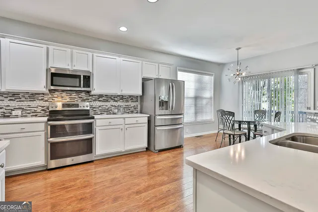 a view of storage and utility room with a sink
