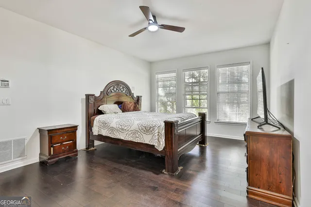 a view of a livingroom with furniture and a window