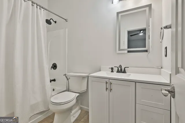 a view of a field with an ocean view