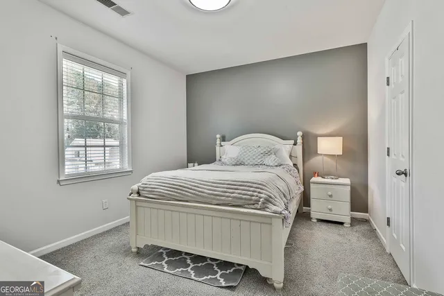 a view of a house with backyard porch and porch