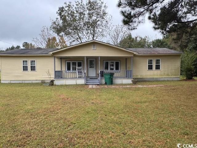 15 Mango Street Andrews, SC 29510 - Photo 1 of 26 View of front of house featuring a porch and a front lawn