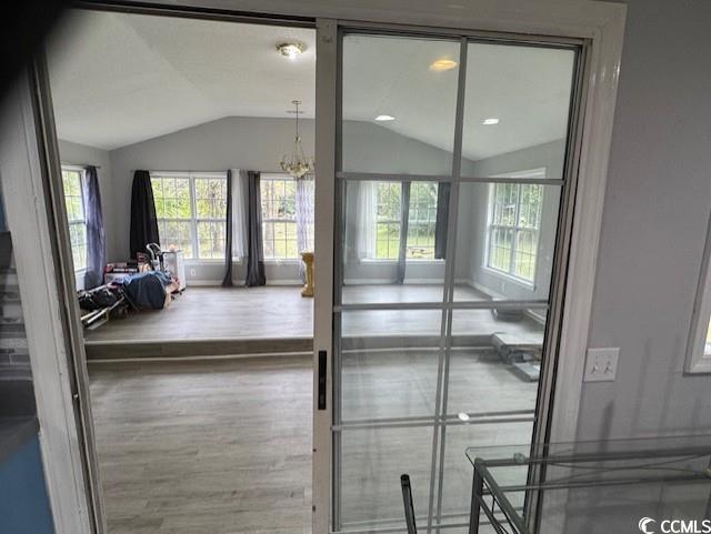 15 Mango Street Andrews, SC 29510 - Photo 16 of 26 Detailed view of a chandelier and wood finished floors