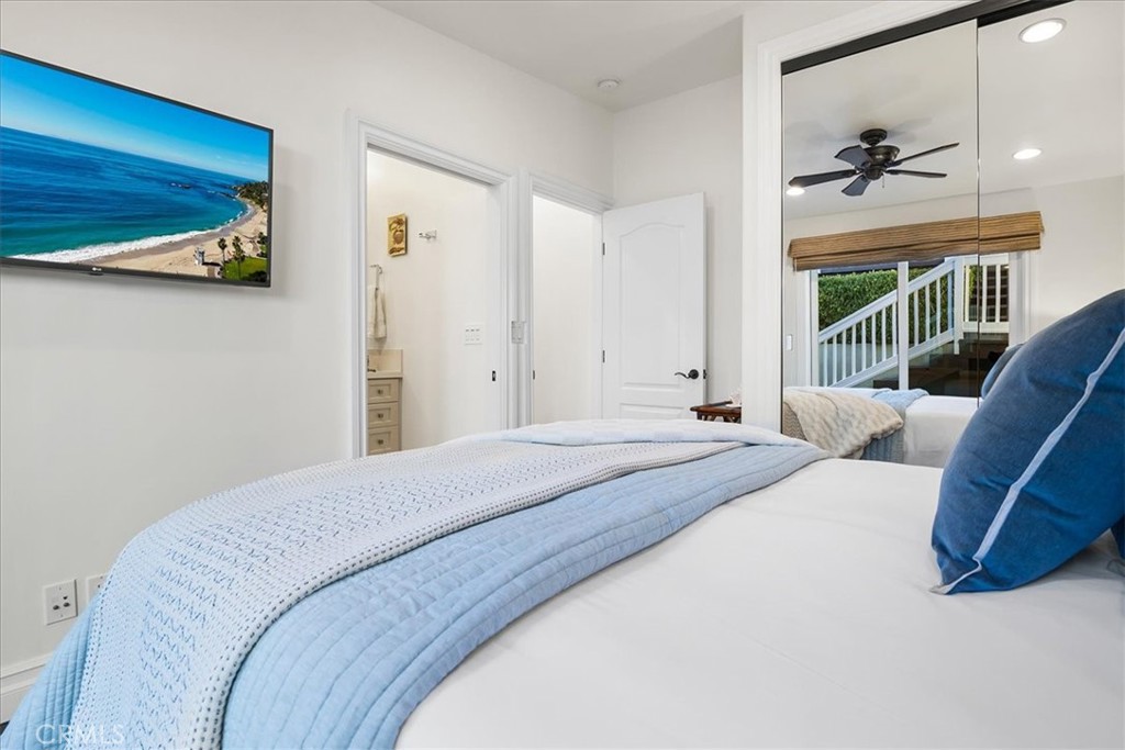 737 Griffith Way Laguna Beach, CA 92651 - Photo 12 of 29 a bedroom with a bed and a couch
