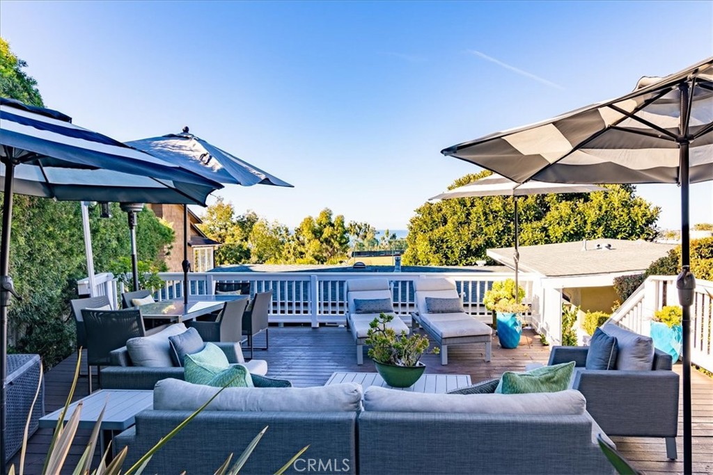 737 Griffith Way Laguna Beach, CA 92651 - Photo 21 of 29 a view of a patio with couches chairs and a potted plant