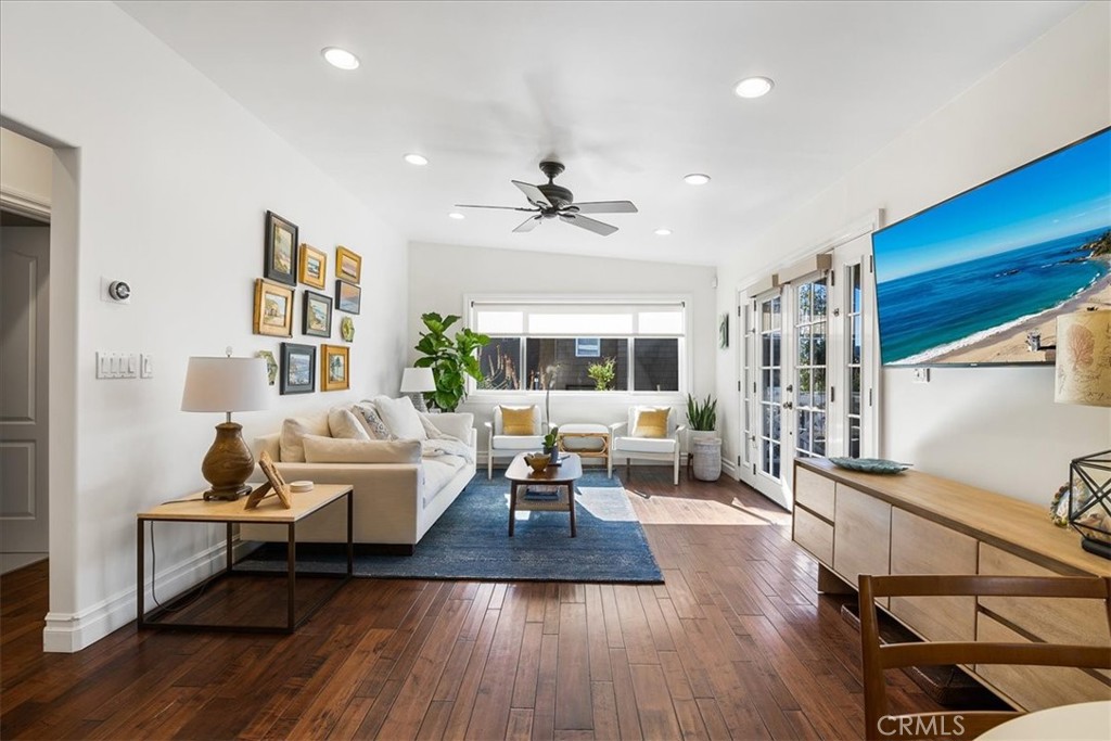 737 Griffith Way Laguna Beach, CA 92651 - Photo 4 of 25 a living room with furniture fireplace and wooden floor