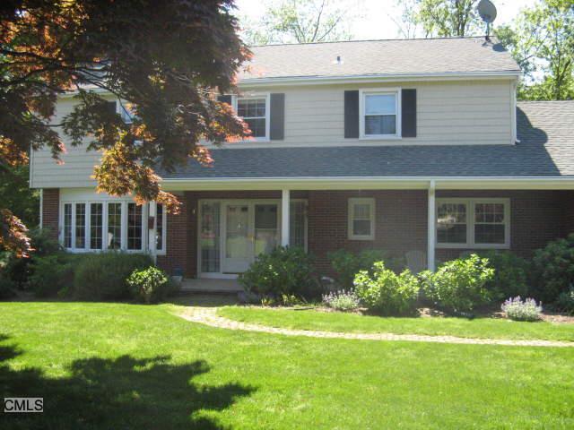 a view of a house with a garden