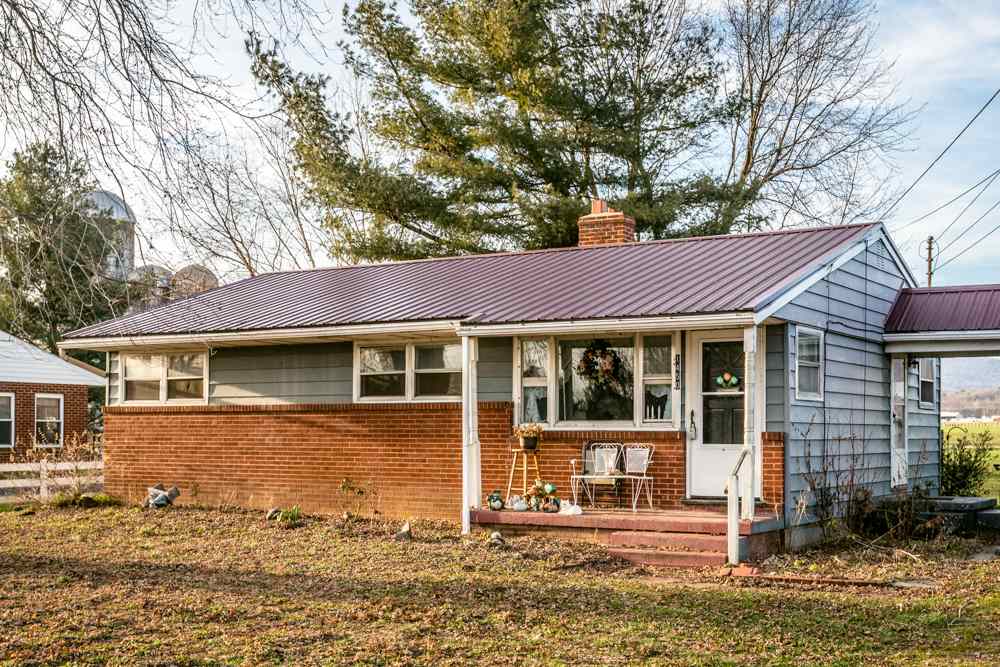 1450 Clover Hill Road Dayton, VA 22821 - Photo 11 of 16 front view of a house with a yard