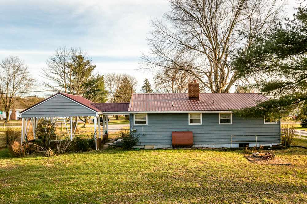 1450 Clover Hill Road Dayton, VA 22821 - Photo 12 of 16 a front view of a house with a yard