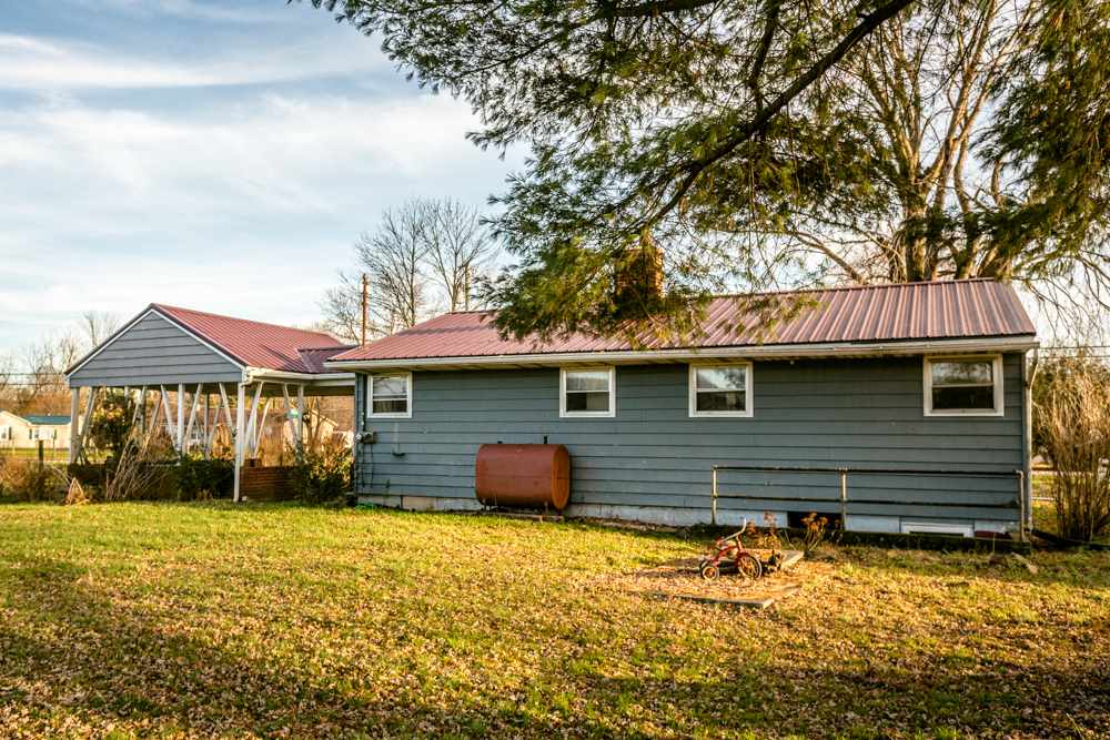 1450 Clover Hill Road Dayton, VA 22821 - Photo 13 of 16 a front view of a house with a yard