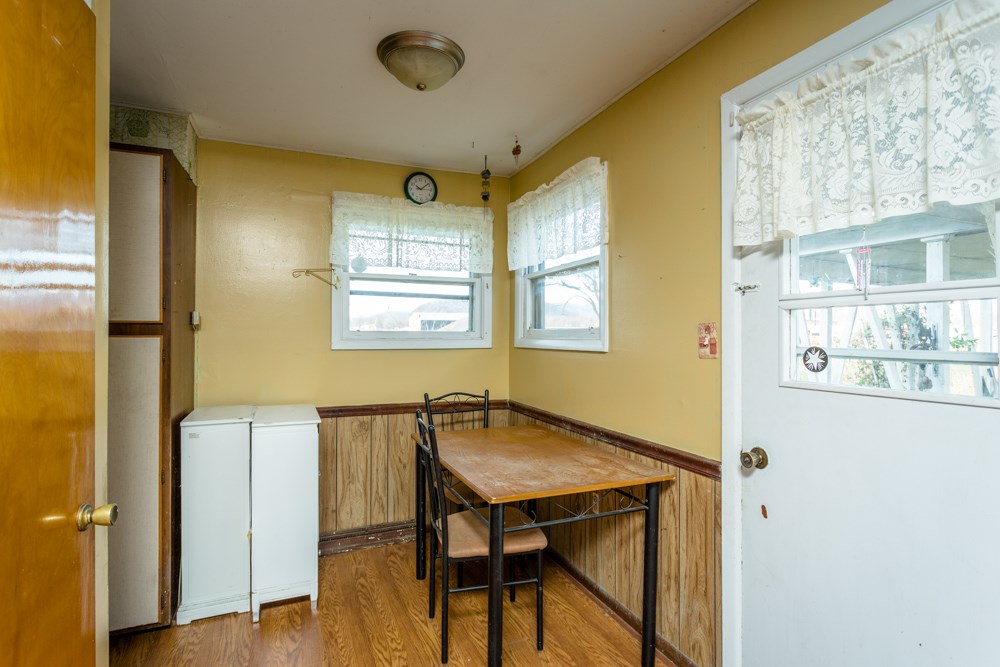 1450 Clover Hill Road Dayton, VA 22821 - Photo 4 of 16 a view of a dining room with furniture and window