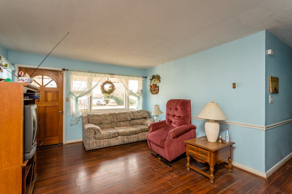1450 Clover Hill Road Dayton, VA 22821 - Photo 6 of 16 a living room with furniture and a window