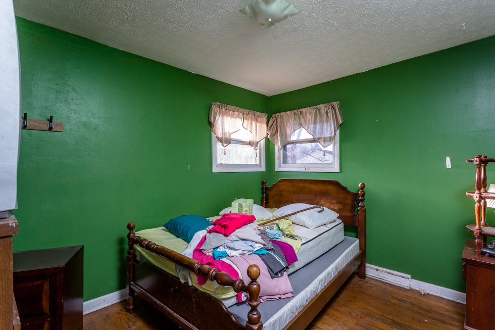 1450 Clover Hill Road Dayton, VA 22821 - Photo 8 of 16 a bedroom with a bed chair and a window