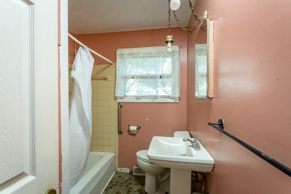 1450 Clover Hill Road Dayton, VA 22821 - Photo 9 of 16 a bathroom with a sink toilet and shower