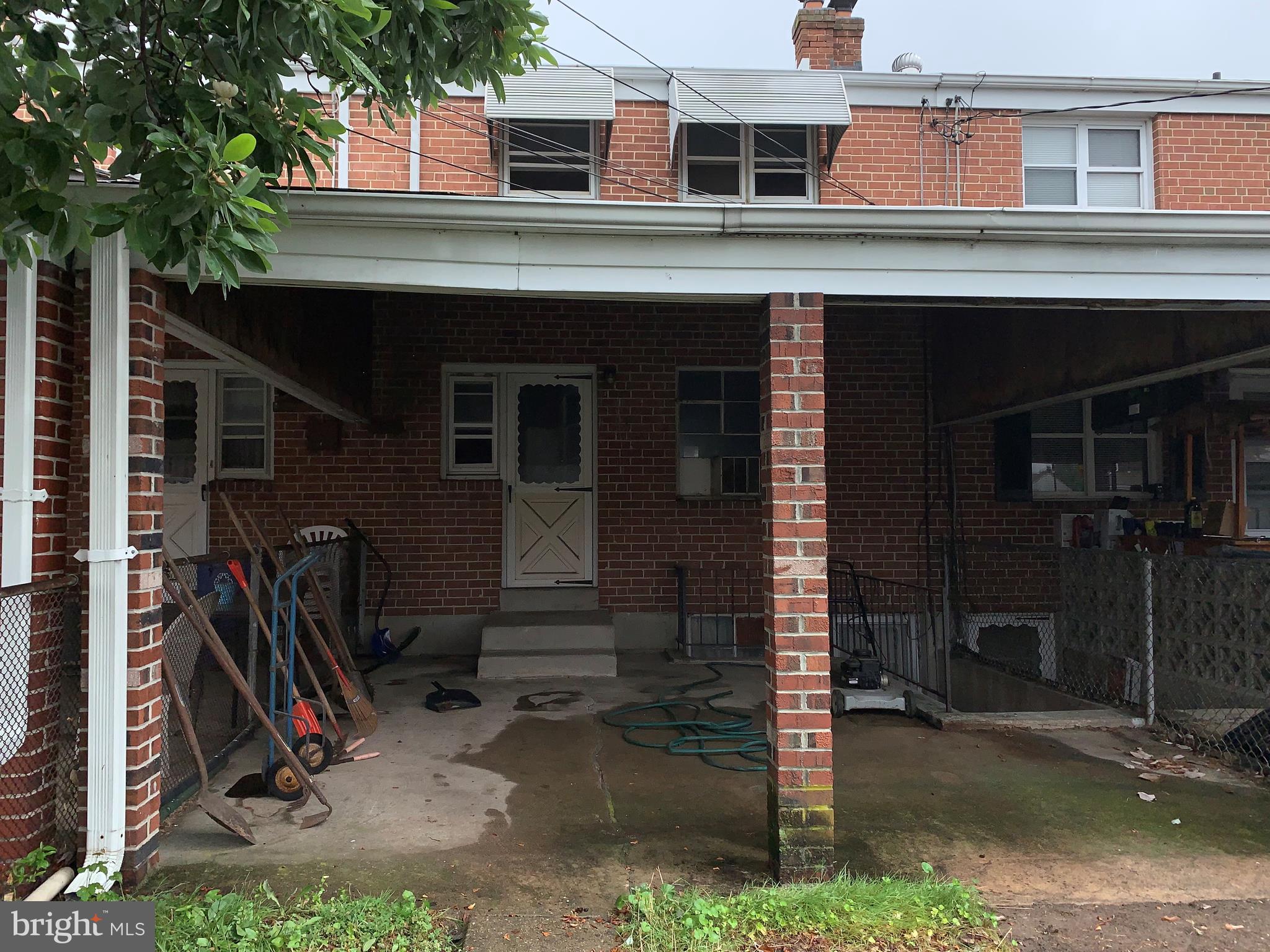 7806 Lockwood Road Baltimore, MD 21222 - Photo 8 of 8 a view of a house with a yard