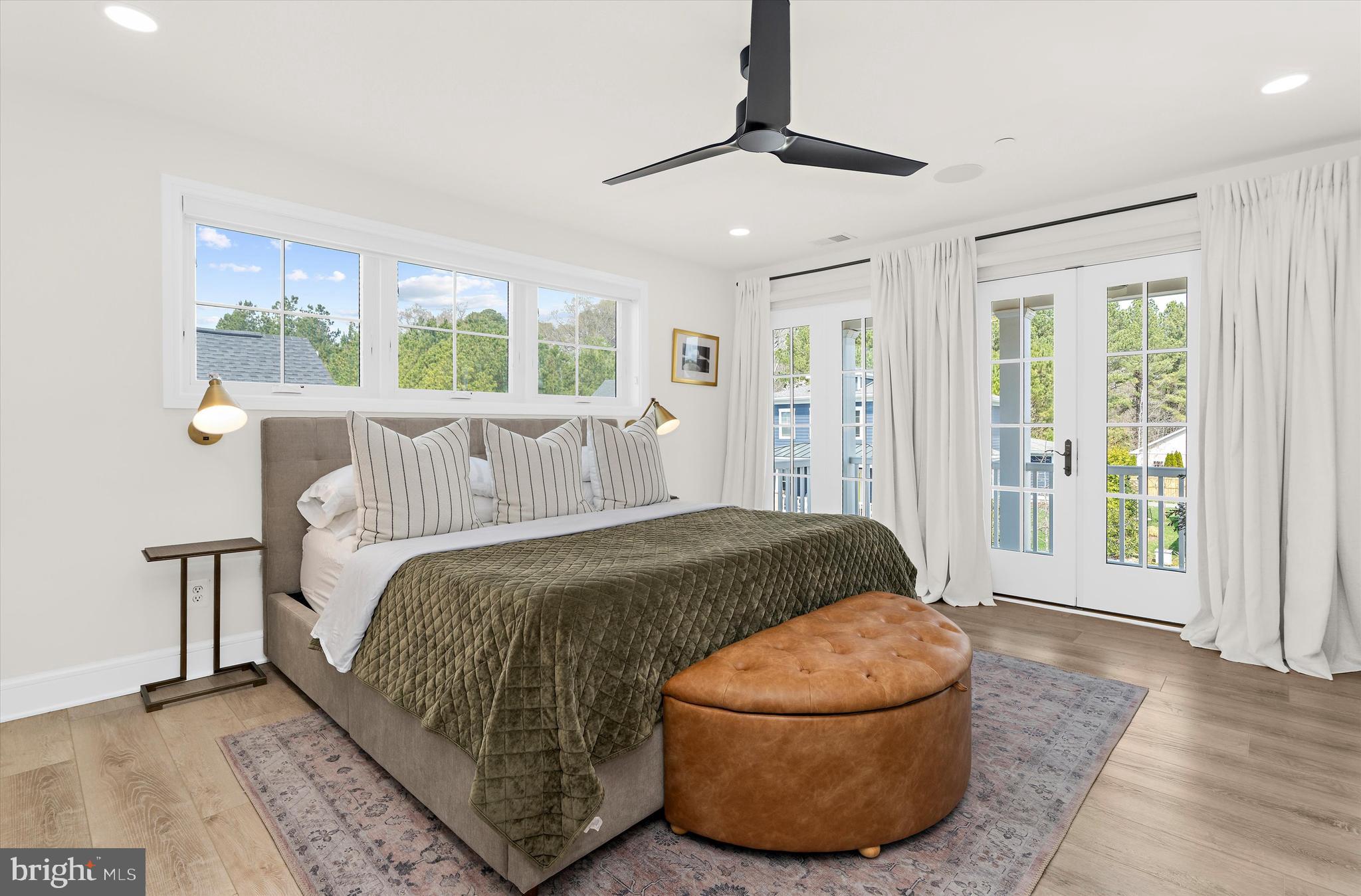 8099 Fox Squirrel Way Easton, MD 21601 - Photo 37 of 82 a bed sitting in a spacious bedroom next to a window
