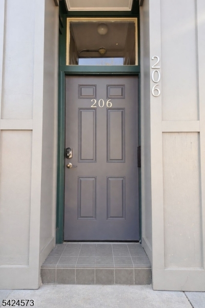 206 Talmage Avenue Bound Brook, NJ 08805 - Photo 1 of 18 a view of a door with wooden door