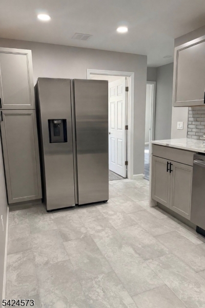 206 Talmage Avenue Bound Brook, NJ 08805 - Photo 7 of 18 a view of kitchen with stainless steel appliances granite countertop cabinets and front door
