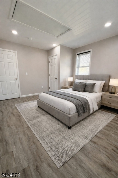 206 Talmage Avenue Bound Brook, NJ 08805 - Photo 8 of 18 a bedroom with a bed and a night stand