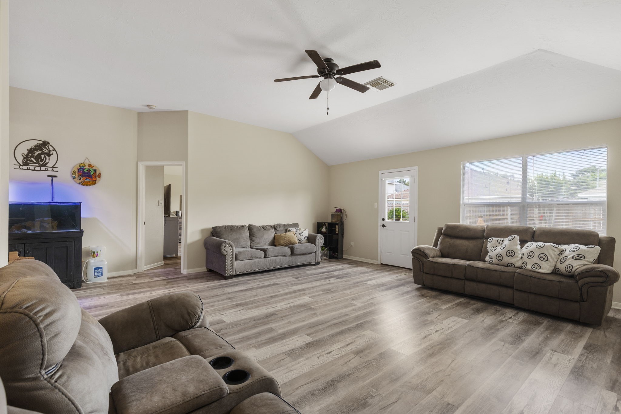 29106 Foxingham Circle Spring, TX 77386 - Photo 21 of 47 a living room with furniture and a large window