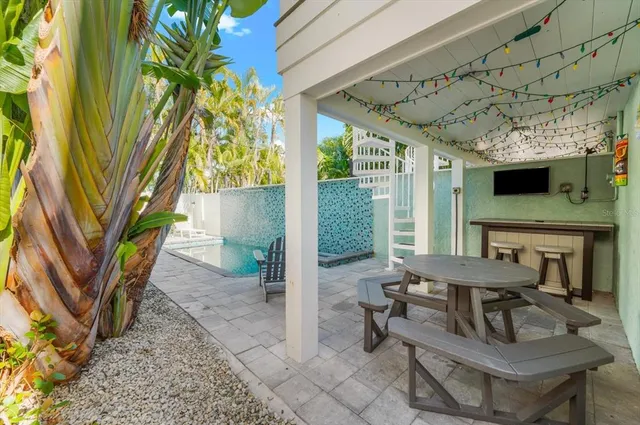 a view of street with palm trees