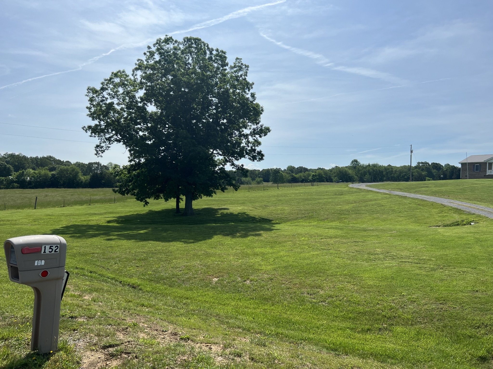 152 Bosham Road Westmoreland, TN 37186 - Photo 30 of 53 a garden with trees in the background
