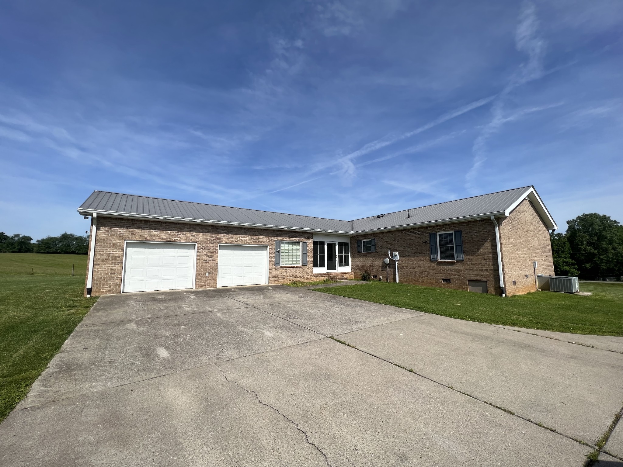152 Bosham Road Westmoreland, TN 37186 - Photo 36 of 53 a front view of house with yard and trees