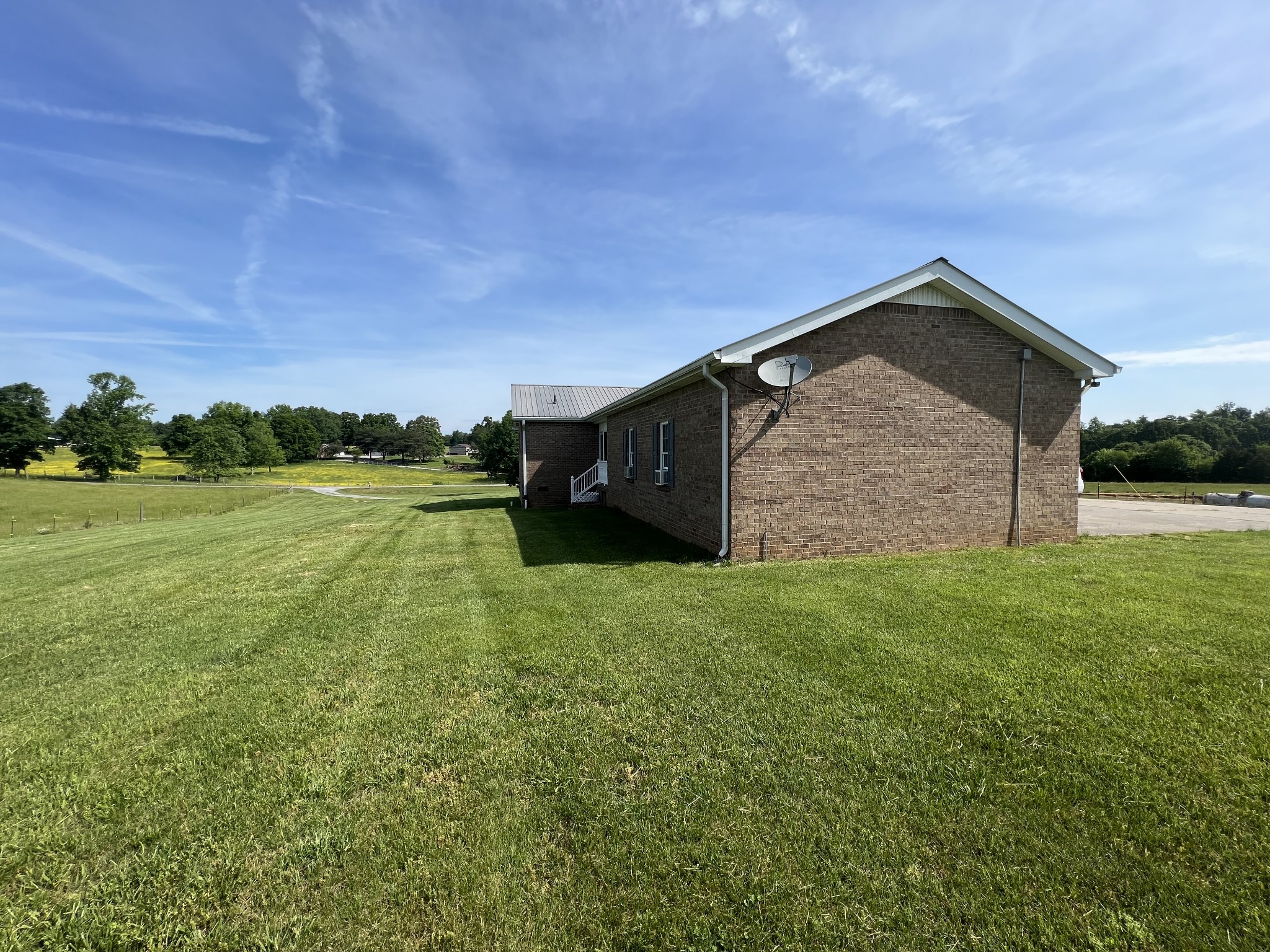 152 Bosham Road Westmoreland, TN 37186 - Photo 37 of 53 a view of a backyard with a garden