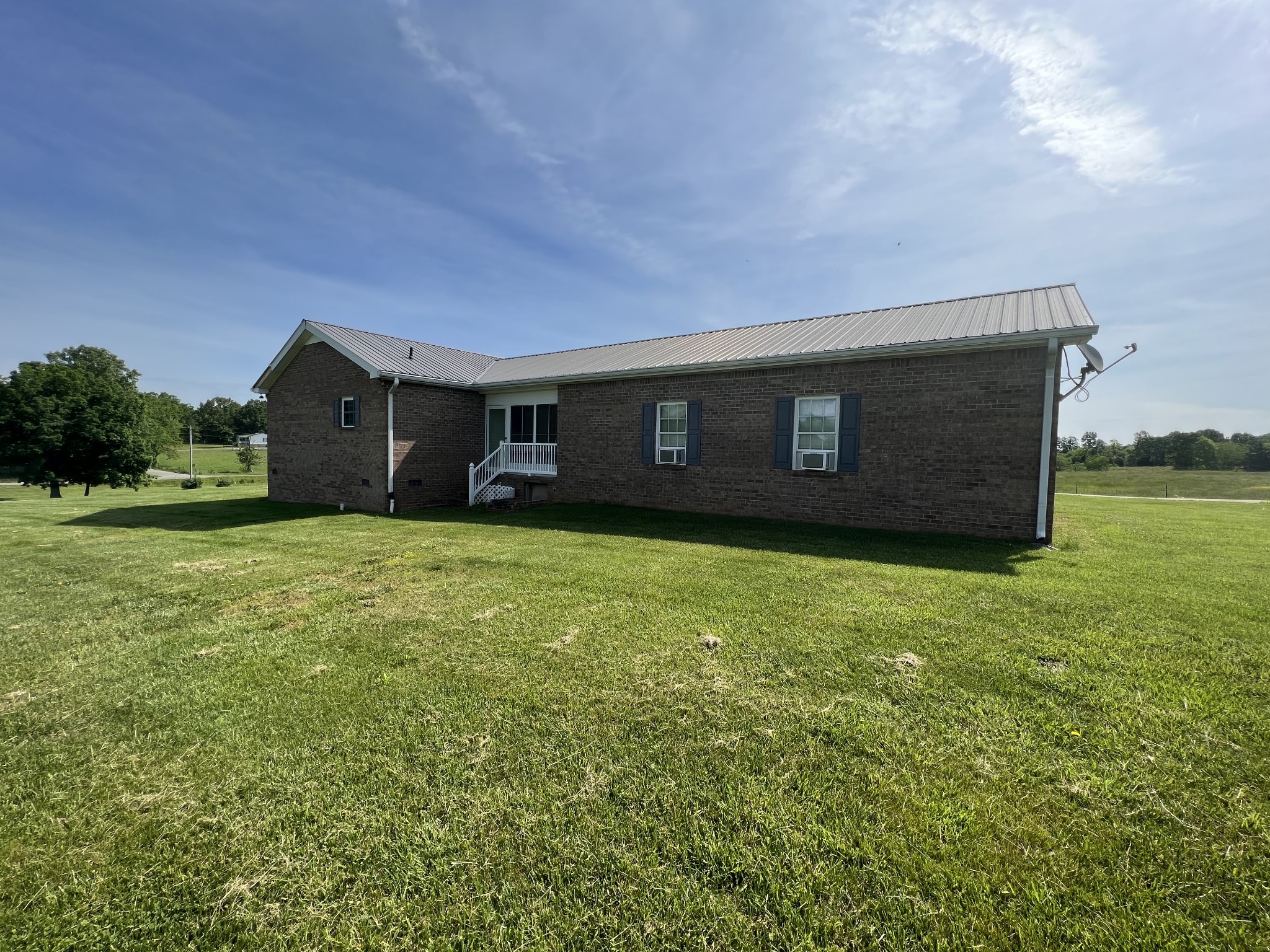 152 Bosham Road Westmoreland, TN 37186 - Photo 38 of 53 a view of a house with a yard