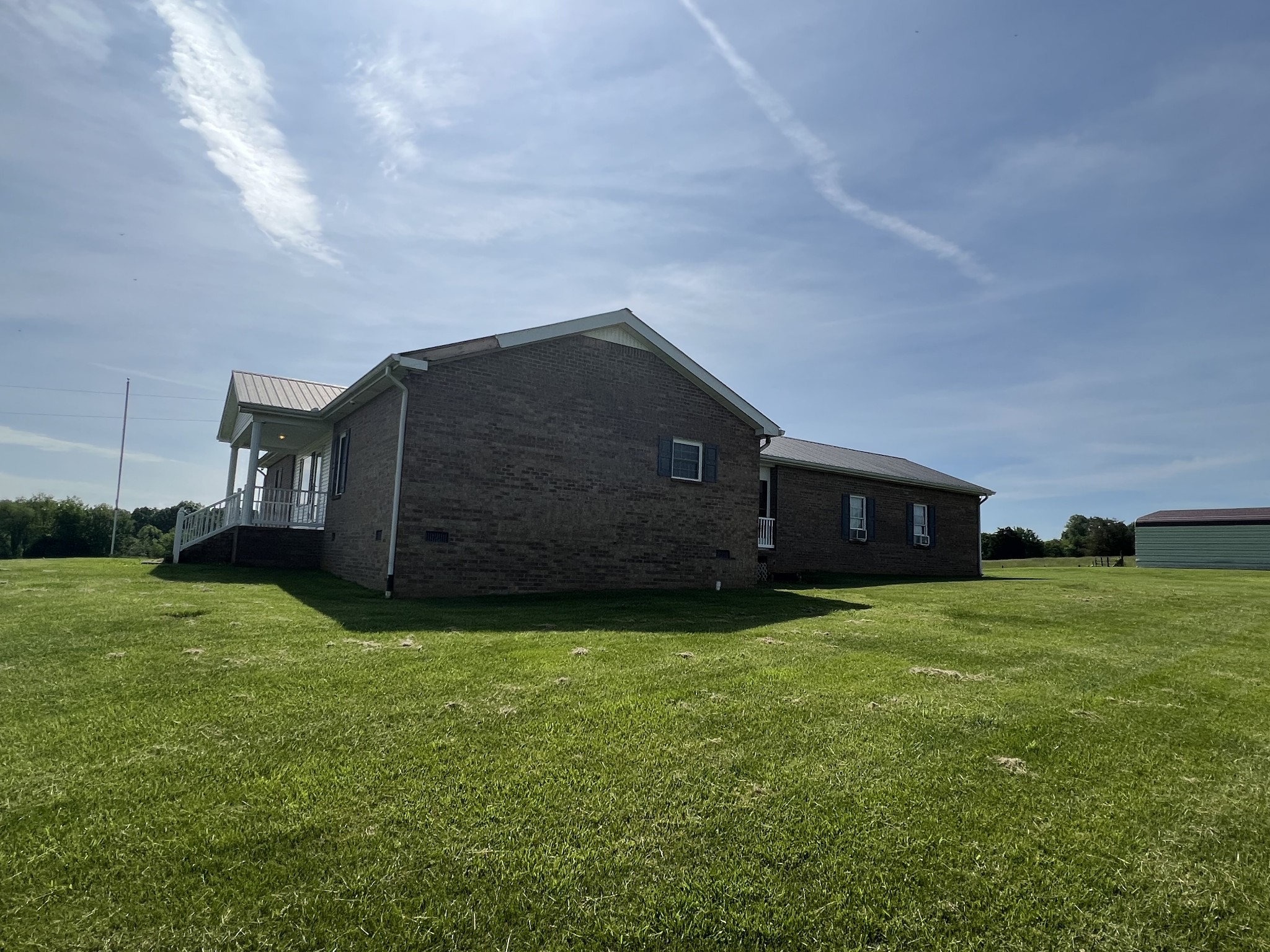 152 Bosham Road Westmoreland, TN 37186 - Photo 40 of 53 a house view with a garden space