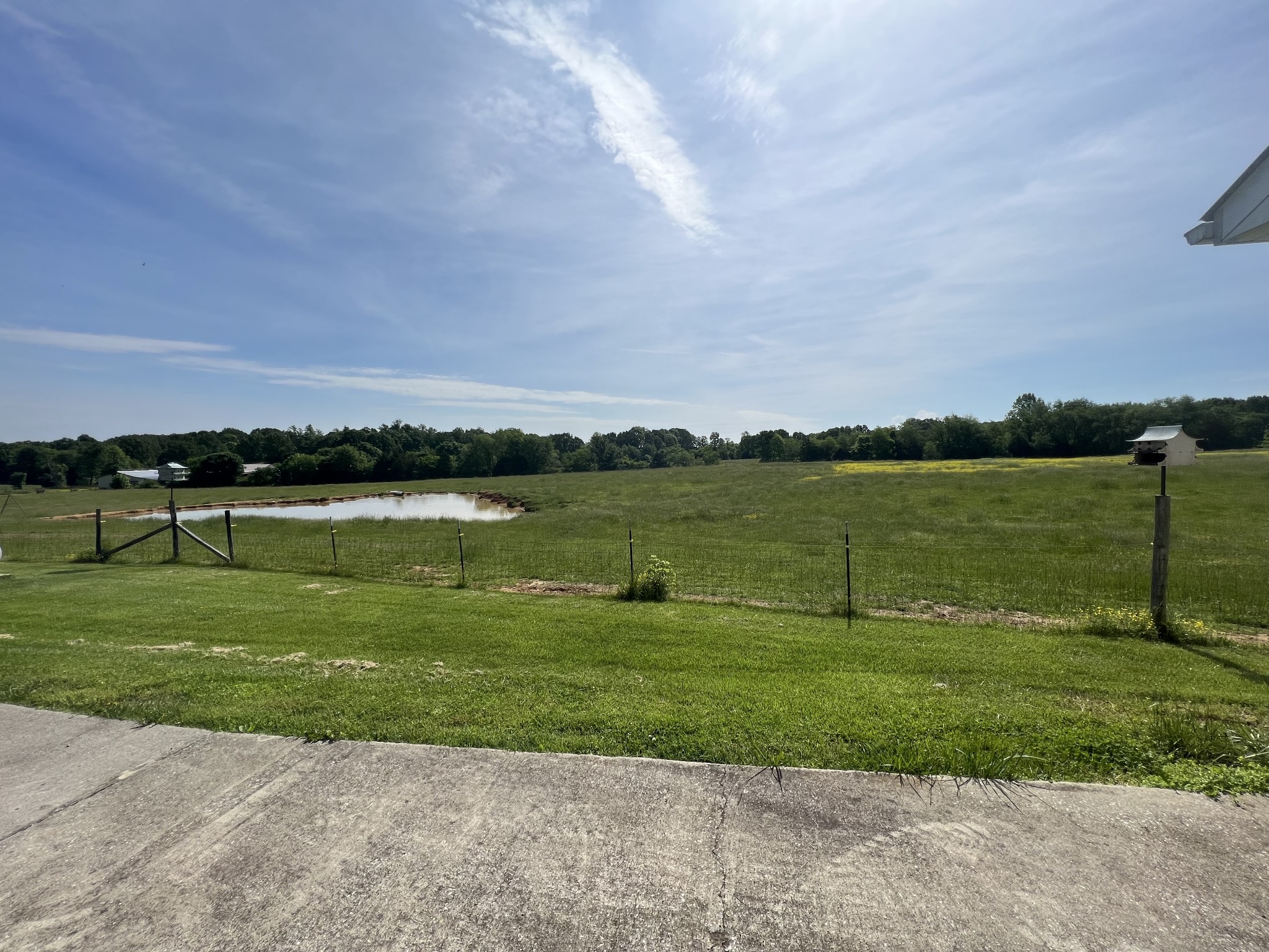 152 Bosham Road Westmoreland, TN 37186 - Photo 44 of 53 a view of a lake with a big yard