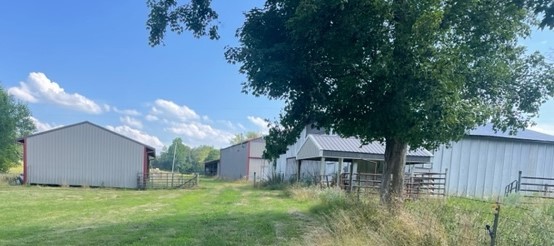 152 Bosham Road Westmoreland, TN 37186 - Photo 52 of 53 a backyard of a house with lots of green space