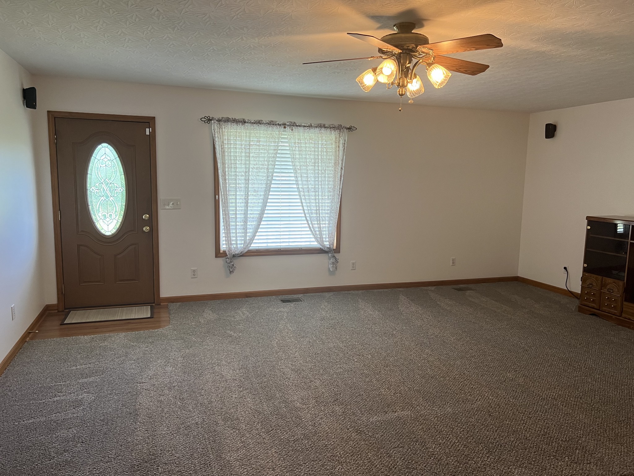 152 Bosham Road Westmoreland, TN 37186 - Photo 9 of 53 an empty room with windows and fan