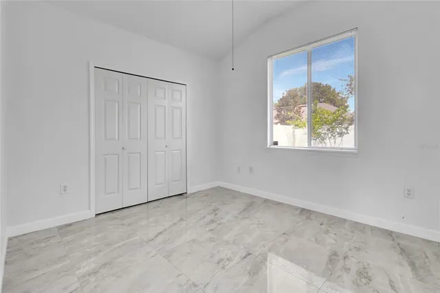 an empty room with windows