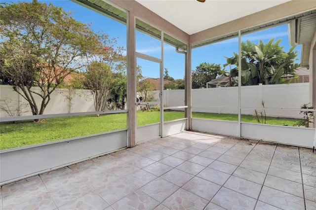 a view of a garden with an outdoor seating