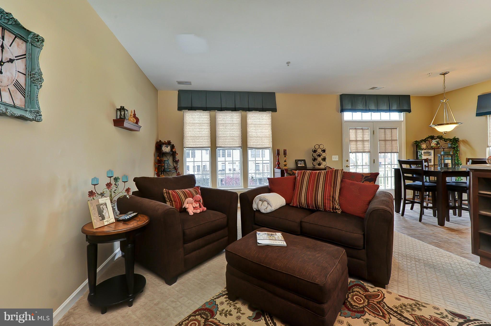 41888 Inspiration Terrace Aldie, VA 20105 - Photo 13 of 30 a living room with furniture and a window