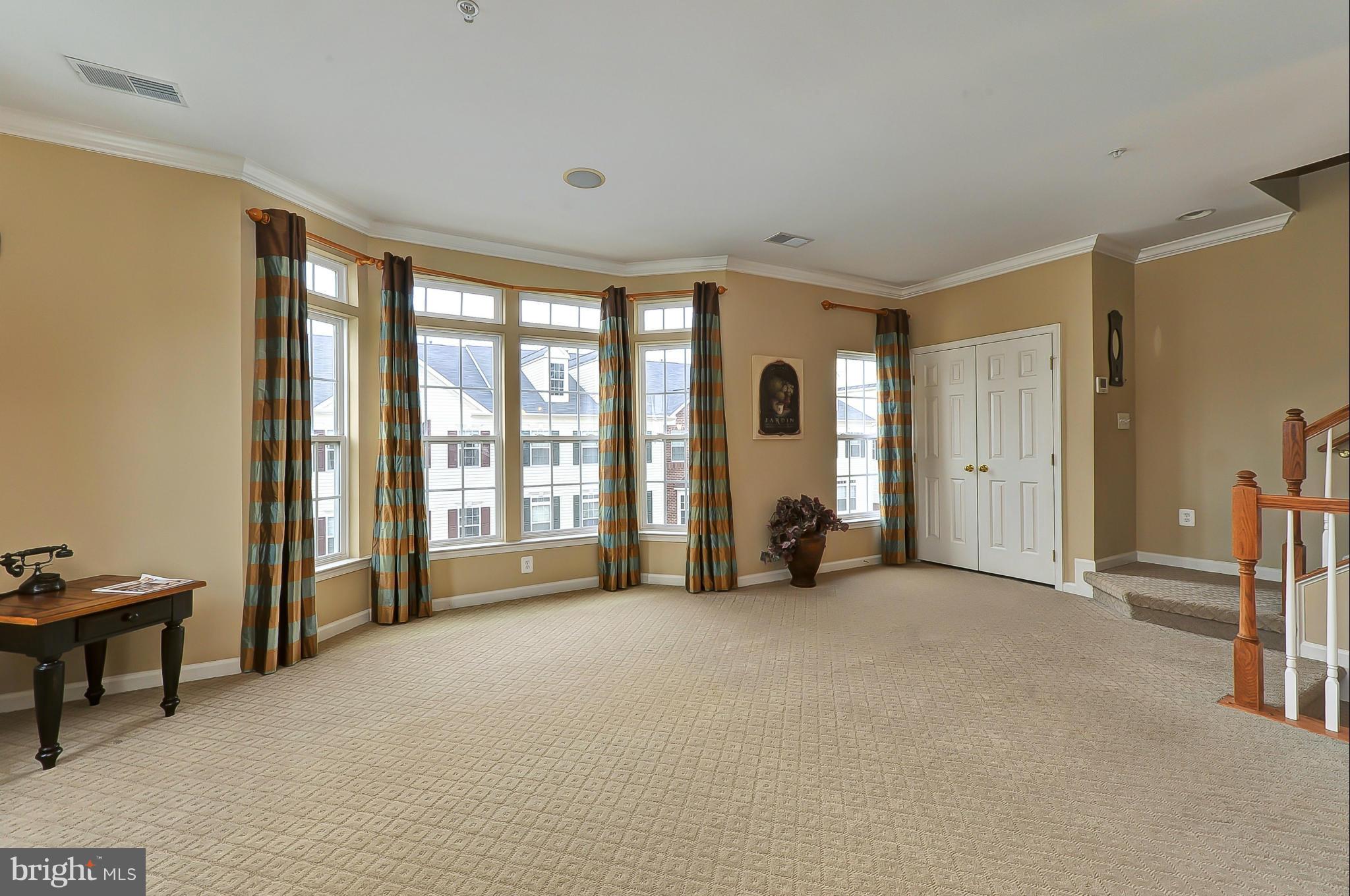 41888 Inspiration Terrace Aldie, VA 20105 - Photo 14 of 30 a view of an empty room with a window