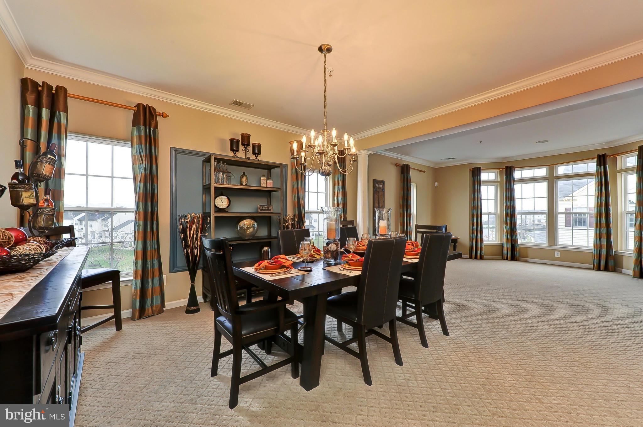 41888 Inspiration Terrace Aldie, VA 20105 - Photo 16 of 30 a view of a dining room with furniture and window