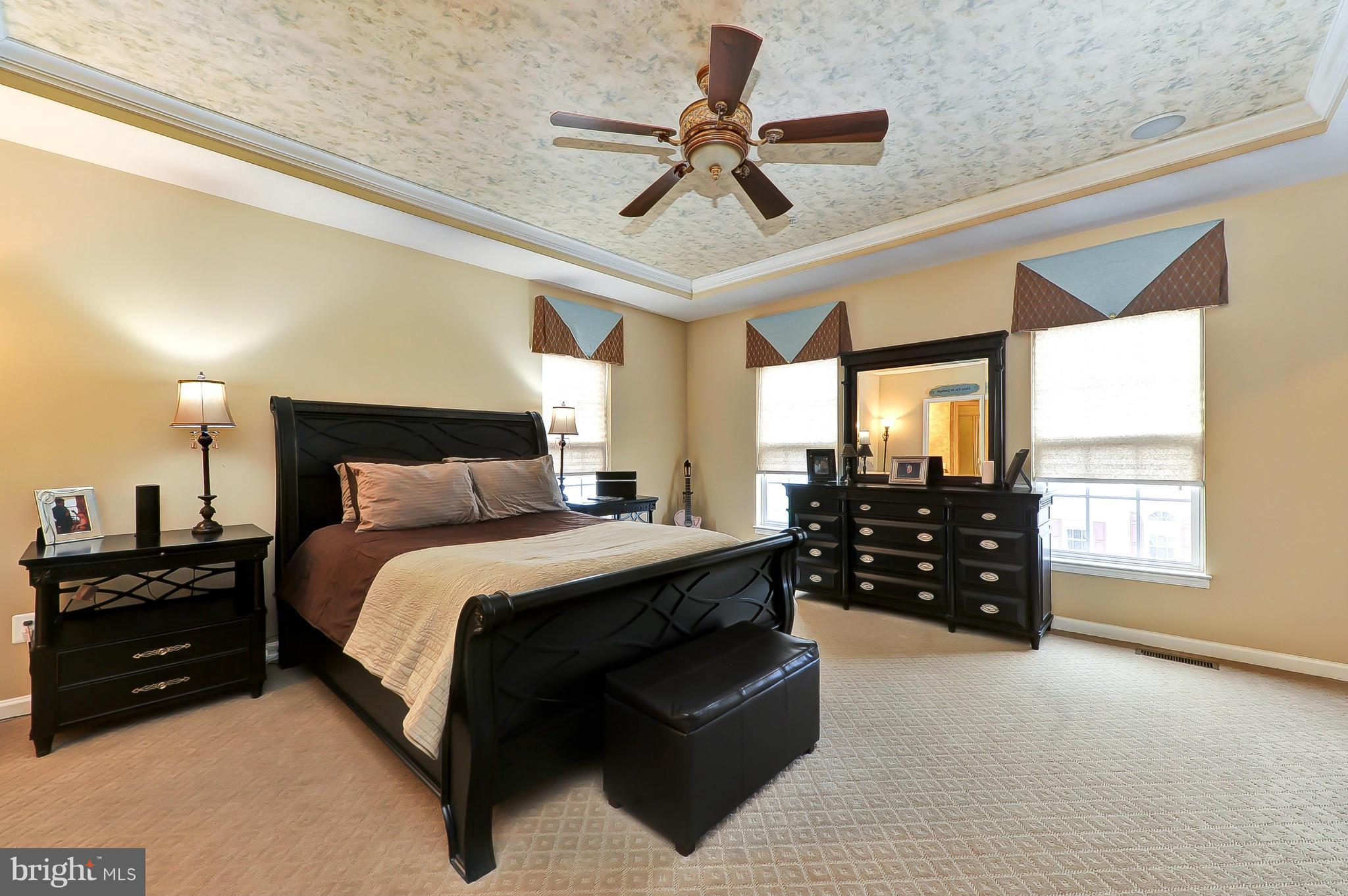 41888 Inspiration Terrace Aldie, VA 20105 - Photo 21 of 30 a bedroom with a bed window and dresser