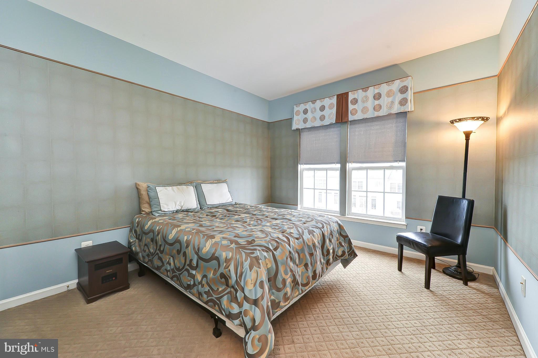 41888 Inspiration Terrace Aldie, VA 20105 - Photo 27 of 30 a bedroom with a bed and a window