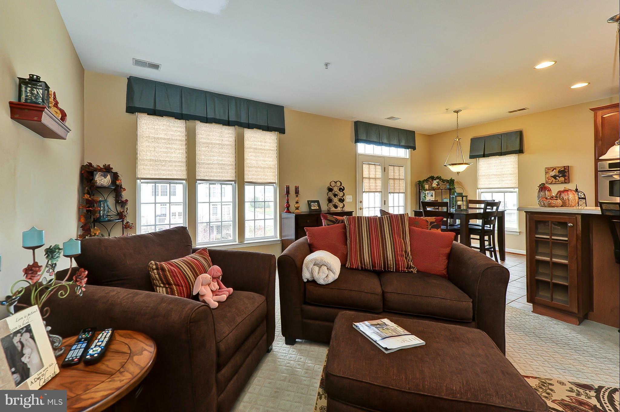 41888 Inspiration Terrace Aldie, VA 20105 - Photo 10 of 30 a living room with furniture and a large window
