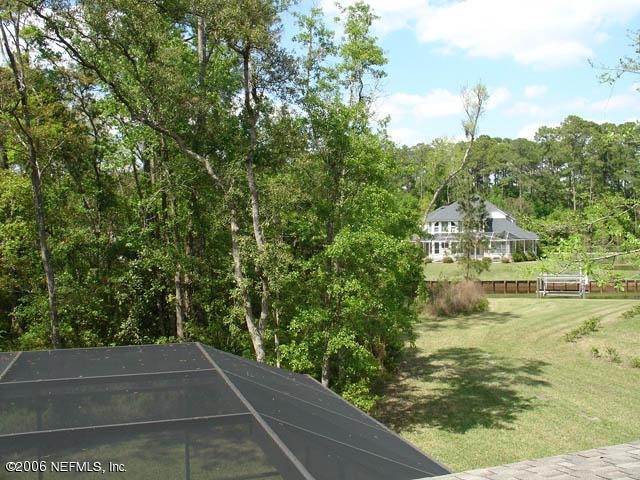 11778 Mandarin Road Jacksonville, FL 32223 - Photo 29 of 31 a view of a lake from a yard