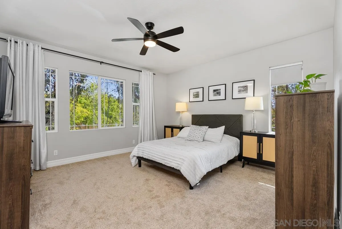 6 Reston Way Ladera Ranch, CA 92694 - Photo 18 of 39 a spacious bedroom with a bed and a window