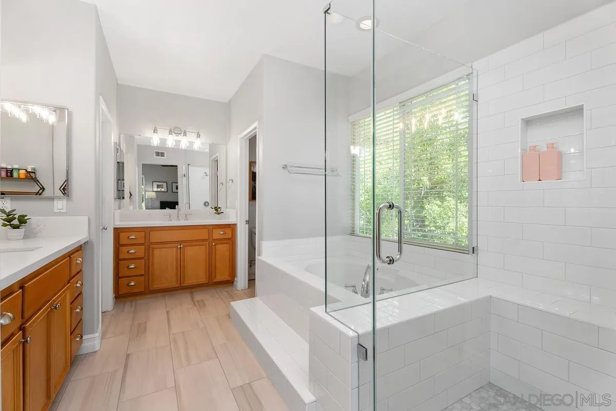 6 Reston Way Ladera Ranch, CA 92694 - Photo 20 of 39 a large bathroom with a large tub and sink