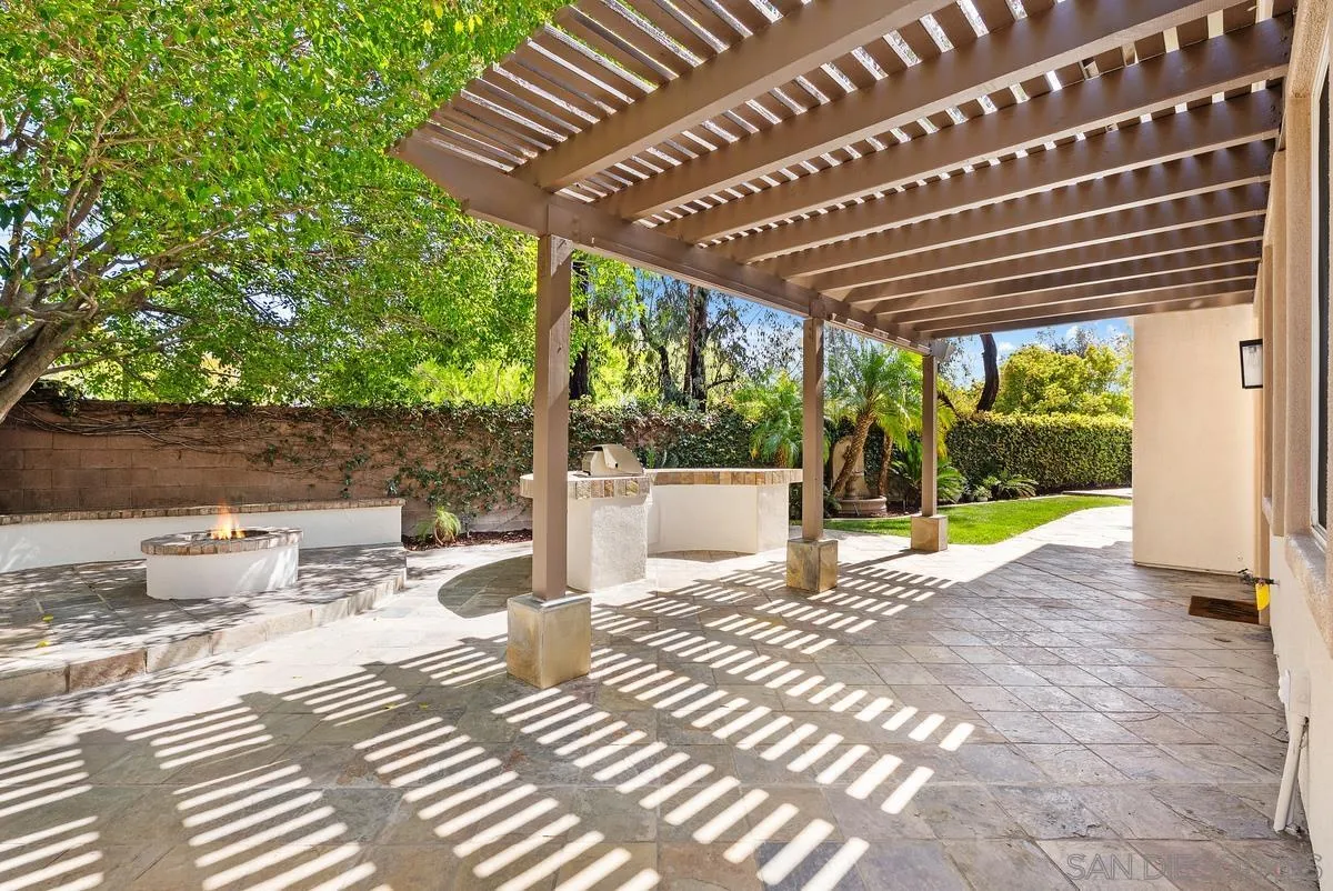 6 Reston Way Ladera Ranch, CA 92694 - Photo 22 of 39 a view of a patio with a table chairs and a backyard