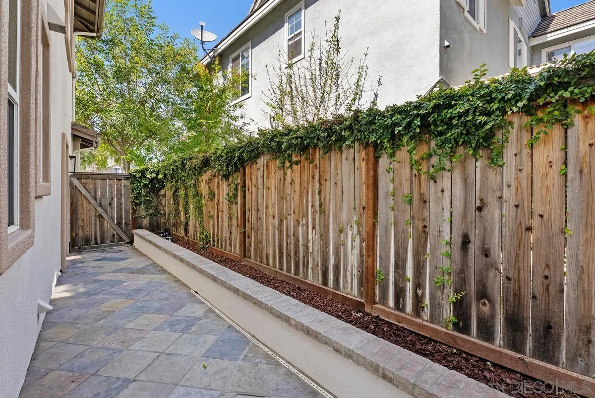 6 Reston Way Ladera Ranch, CA 92694 - Photo 25 of 39 a view of a wooden fence with a house in the background